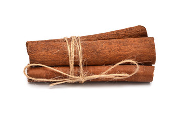 Cinnamon sticks with twine isolated on a white background. Perfectly retouched, full depth of field on the photo. Top view, flat lay