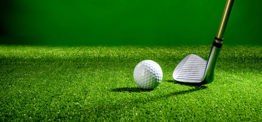 Image with golf club and golf ball on the turf. Horizontal banner solution