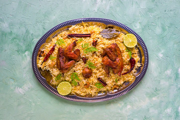 Mandi Kabsa, Yemenis style. Festive dish with baked chicken and rice