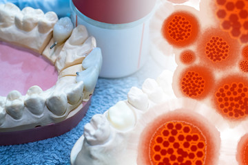 Figure viruses on the background of prostheses. Concept - violation of sanitary standards. Concept - keeping dentures in the wrong conditions. Virus infection in the dental office. Infectious Disease