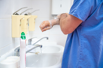 Washing hands with disinfectant soap as a precaution against disease and infection. The basic daily hygiene