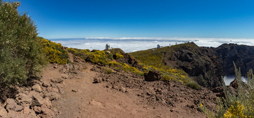 Fototapeta na wymiar Super wide panorama of Roque de los Muchachos Observatory located in the island of La Palma in the Canary Islands. Observatory at Caldera De Taburiente. Science and technology