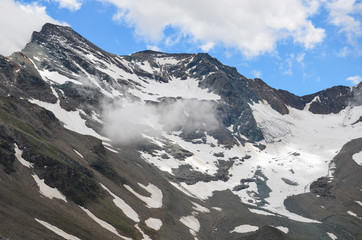 Cloudy view over the grossglockner mountain alps