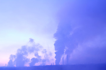 Poisoning of nature. Industrial dawn. Nature pollution concept copy space. Metallurgical factory background.