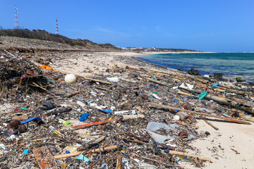 A huge amount of plastic trash thrown onto an Asian beach