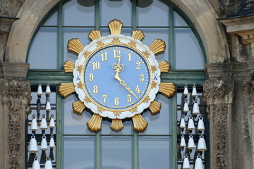 Close-up of the clock and the Meissen Porcellain bells of the Glockenspiel Pavillion at Sophien-Gate of the Zwinger in Dresden, Germany, Europe