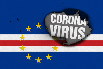 Flag of Cape Verde with burned out hole showing Coronavirus name in it. 2019 - 2020 Novel Coronavirus (2019-nCoV) concept, for an outbreak occurs in the Cape Verde.