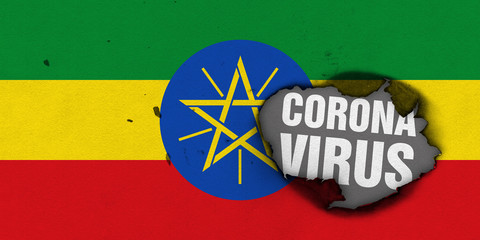 Flag of Ethiopia with burned out hole showing Coronavirus name in it. 2019 - 2020 Novel Coronavirus (2019-nCoV) concept, for an outbreak occurs in the Ethiopia.