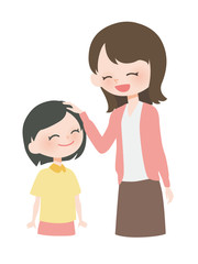 子どもを褒める母親