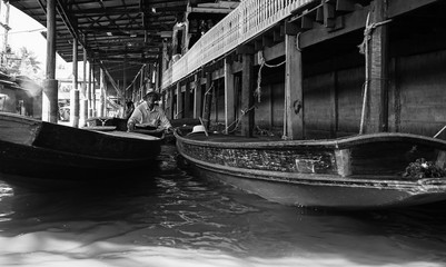 Fototapeta na wymiar boats on the river in black and white