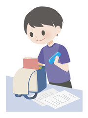 ランドセルに教科書を入れる男の子