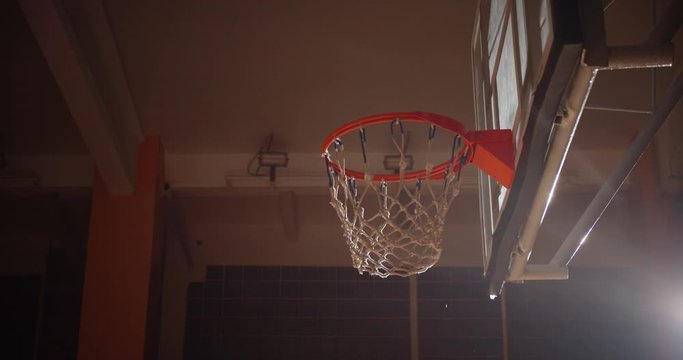 Close-up Basket Basketball Ball Slam Dunk Curly Caucasian Player Jump Ray of Light