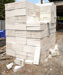 group of white aerated brick or lightweight concrete prepare for building wall house. square block cement in construction estate site
