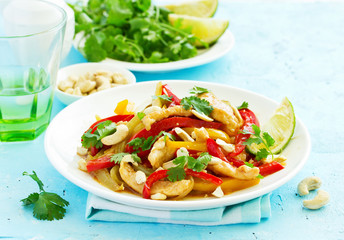 Chicken with vegetables in sweet and sour sauce.