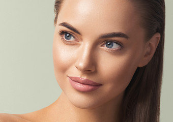 Fototapeta premium Woman face beautiful femal eyes lips cosmetic healthy skin