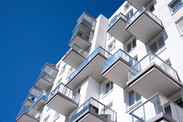 Modern and new apartment building. Multistoried modern, new and stylish living block of flats.