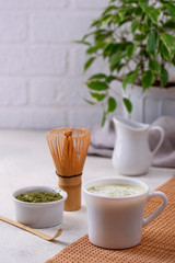 Green healthy matcha latte drink