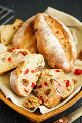 Homemade bread with nuts and dried fruits. Selective focus