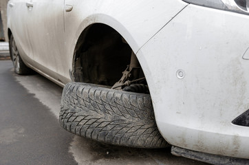  Front end of a vehicle after a car accident. Broken Car Suspension