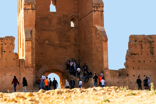 Tlemcen, Algeria - march 14, 2020: peoples taking pictures with Ancient ruins of El Mansourah