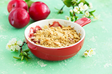 Plum crumble with almond crumb.