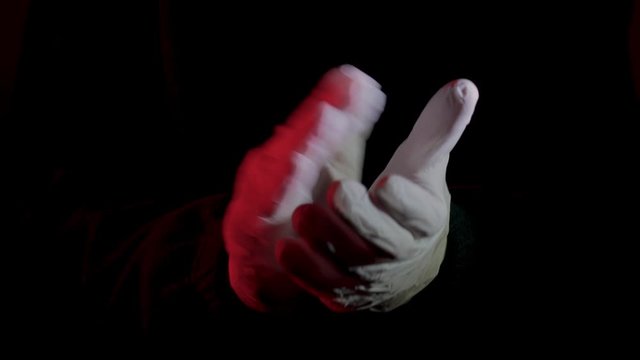 Applause with latex gloves