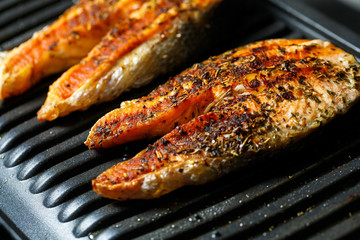 grilled salmon steaks until golden brown with spices and lemon juice