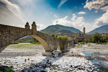 medieval bridge in Bobbio Italy - obrazy, fototapety, plakaty
