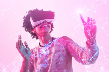 Cheerful black female interacting with network in virtual reality