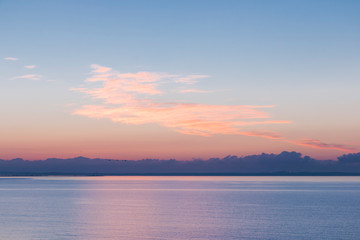 Naklejka premium sunset over the lake