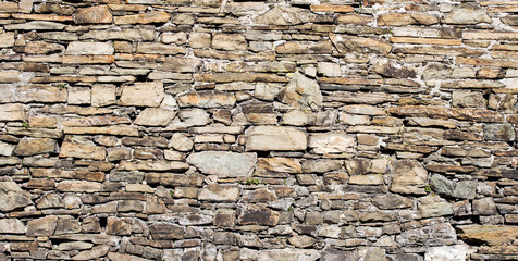 old stone wall of stones