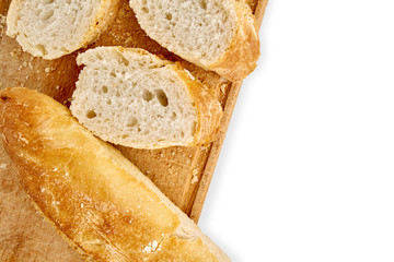 French lunch, breakfast baguette, Fresh natural French baguette, natural wooden cutting board, morning pastries from the bakery, delicate baguette, golden crust