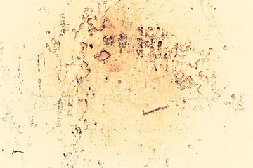 Vintage yellow background. Rough painted wall of aspen gold color. Imperfect plane of golden colored. Uneven old decorative toned backdrop of yellow tint. Texture of gold hue. Ornamental stony surface