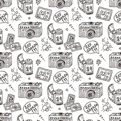 Vector Seamless Pattern with Hand Drawn Doodle Retro Photo Cameras