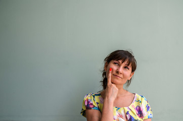 Pretty brunette girl in a thoughtful expression needs a solution has many questions or ideas. Think...