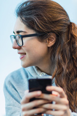 Young woman with mobile phone