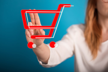 Businessman pressing modern technology panel shopping cart web phone credit card.