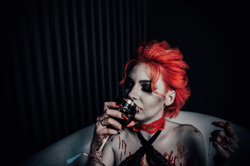 Vampire in underwear in a blood bath