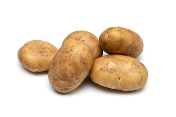 raw dirty potatoes on a white background