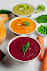 Set of vegetable soups. Soup from broccoli, spinach, green peas. Pumpkin and carrot soup. beetroot...