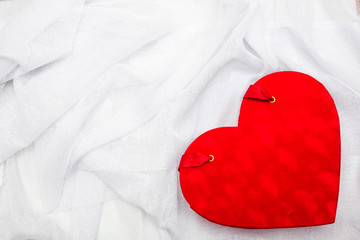 Red heart on a white background. 