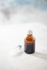 medical surgical mask, syringe and bittles on white background