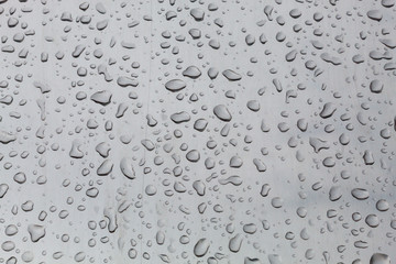 Water Drops on Gray Metal Background