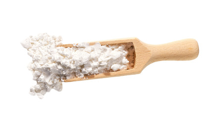 Scoop with corn starch  isolated on a white background. Top view.