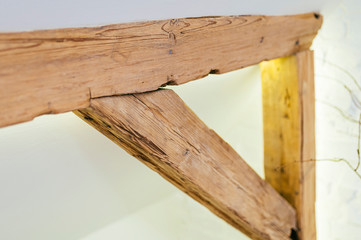 Old restored wooden joints in ceilings in a top floor apartment.  (shallow depth of field image )