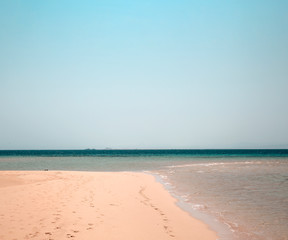 Summer photo of beach with sea and sunny warm day 