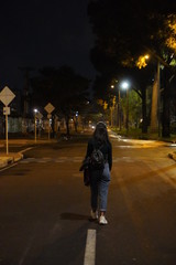 woman walking on the street night