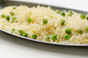 Egg fried rice served on the metal tray, an addition to an Indian or Asian main course