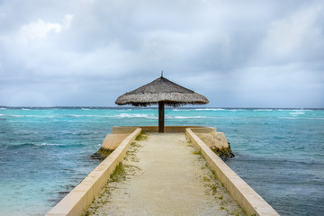 Umbrella and view of Pacific Ocean