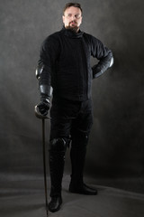 A man with a beard with a sword. Historical European Martial Arts, armor and weapons for practice....
